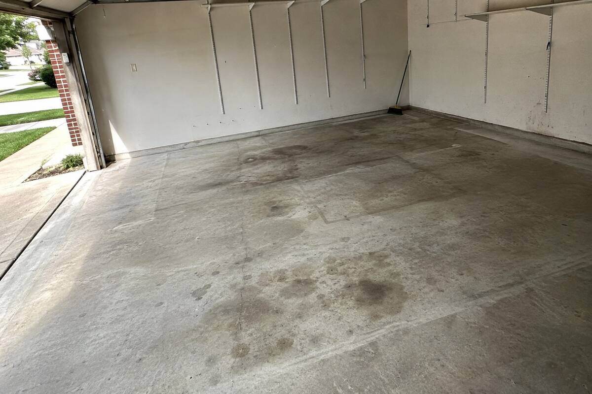 An emptied garage swept clean after a cleanout